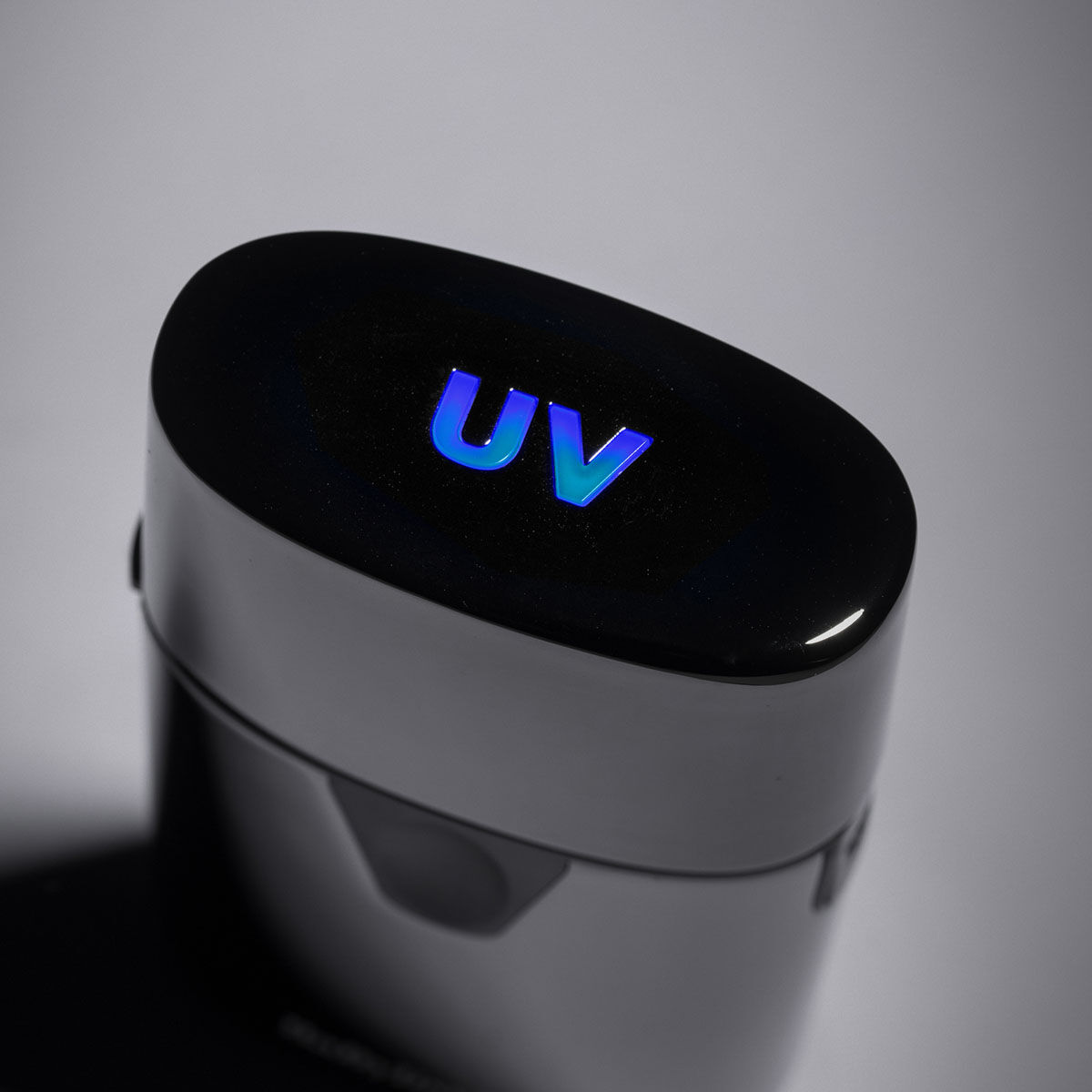 Close up of cap showing UV light turned on